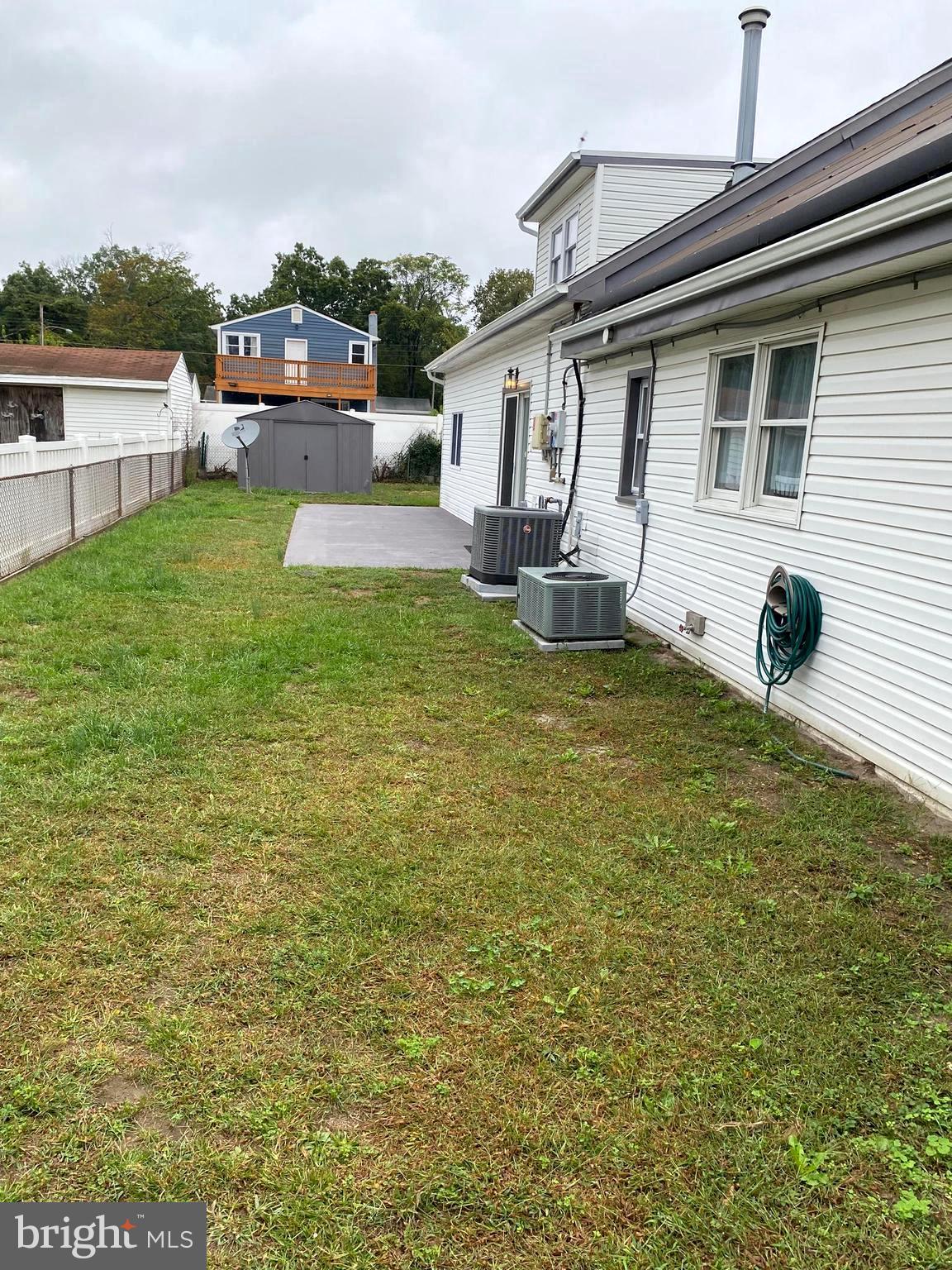 15 East 8th Avenue Pine Hill, NJ 08021 - Photo 32 of 32 a view of a house with a yard and sitting area