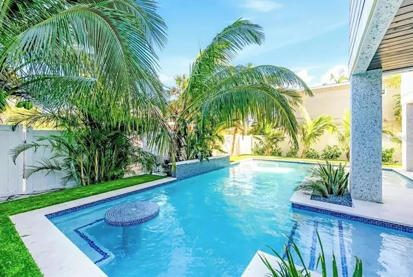 a view of yard from a tub