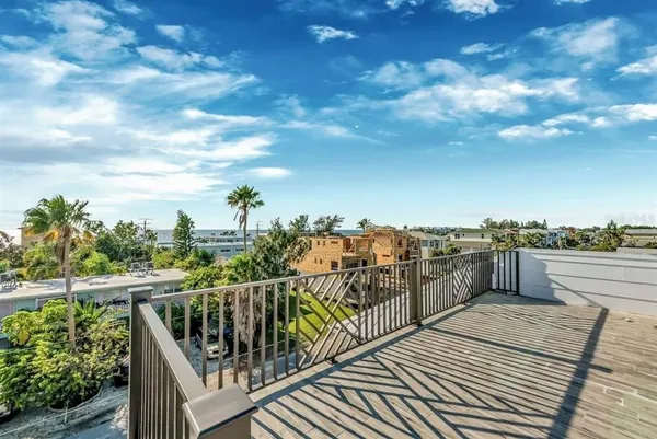 a view of a balcony with city view