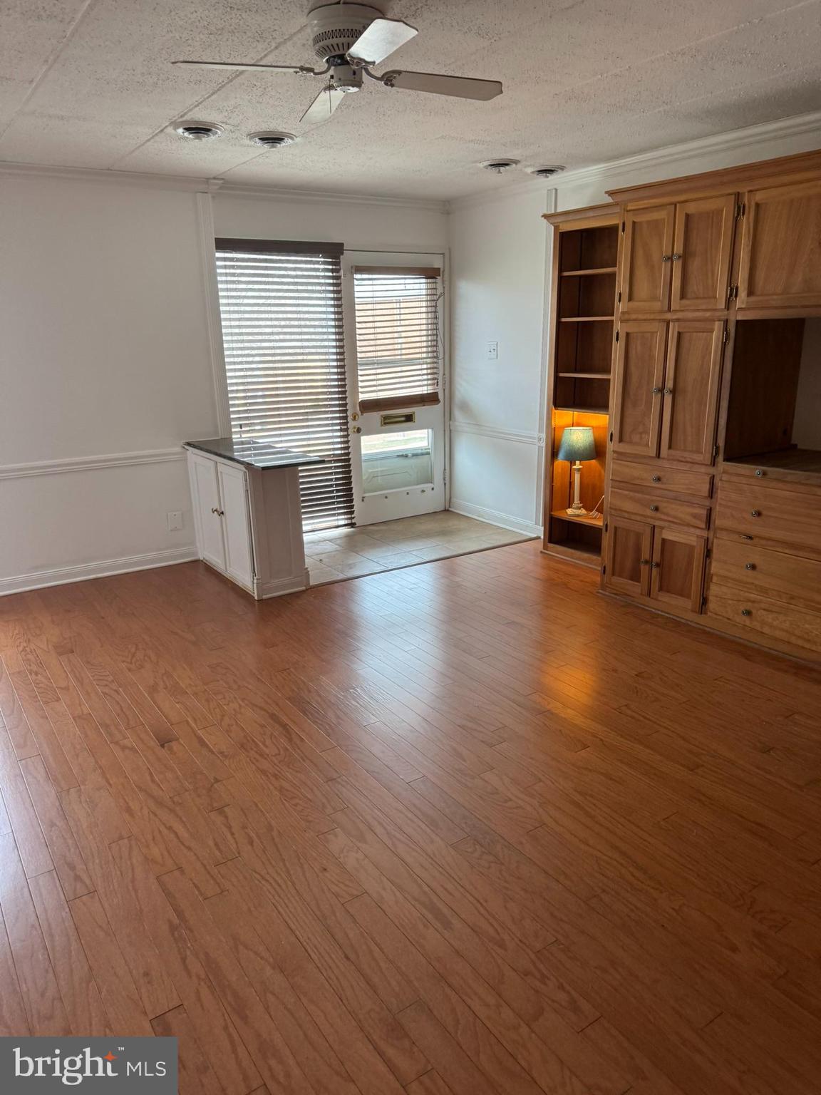 2633 Fort Farnsworth Road, Unit 268 Alexandria, VA 22303 - Photo 2 of 13 wooden floor in an empty room with a window