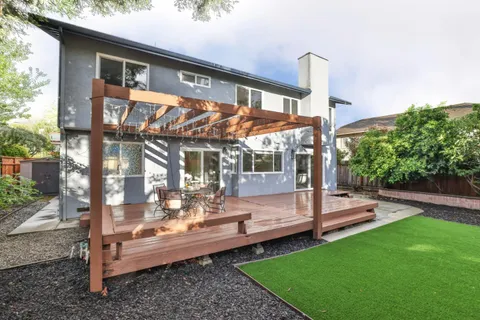a view of yard with patio