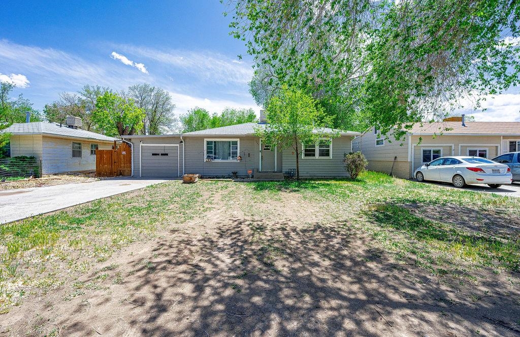 2893 Seely Road Grand Junction, CO 81503 - Photo 26 of 28 a house view with a garden space