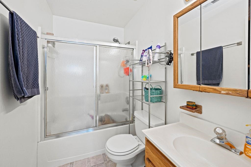 2893 Seely Road Grand Junction, CO 81503 - Photo 6 of 28 a bathroom with a sink toilet and shower