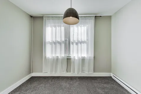 an empty room with window