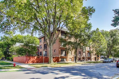 a view of city with tall buildings