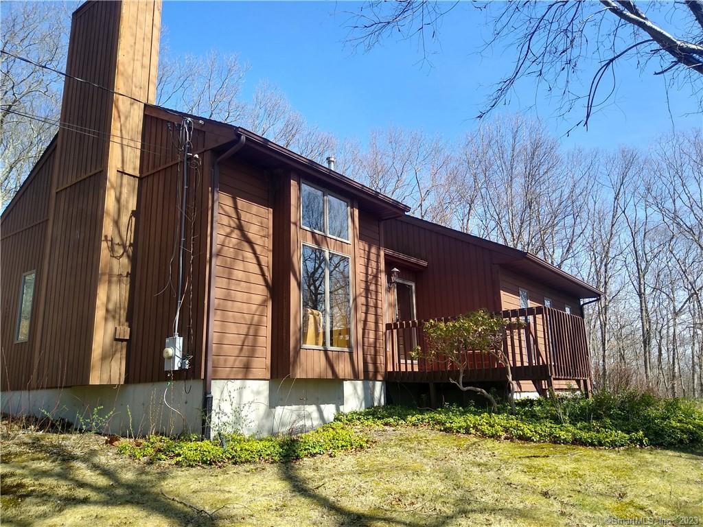 Welcome to 90 Van Cedarfield Rd. View of front of home with front porch and family room windows that bring the sunsets to you door every night.