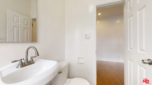 a bathroom with a sink and a toilet