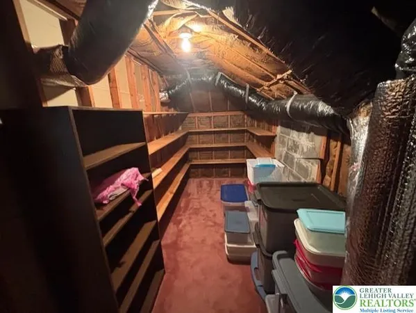 a view of storage and utility room