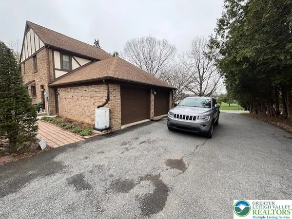 a car parked in front of a house