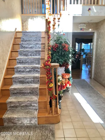 a kitchen with stainless steel appliances a sink stove and refrigerator
