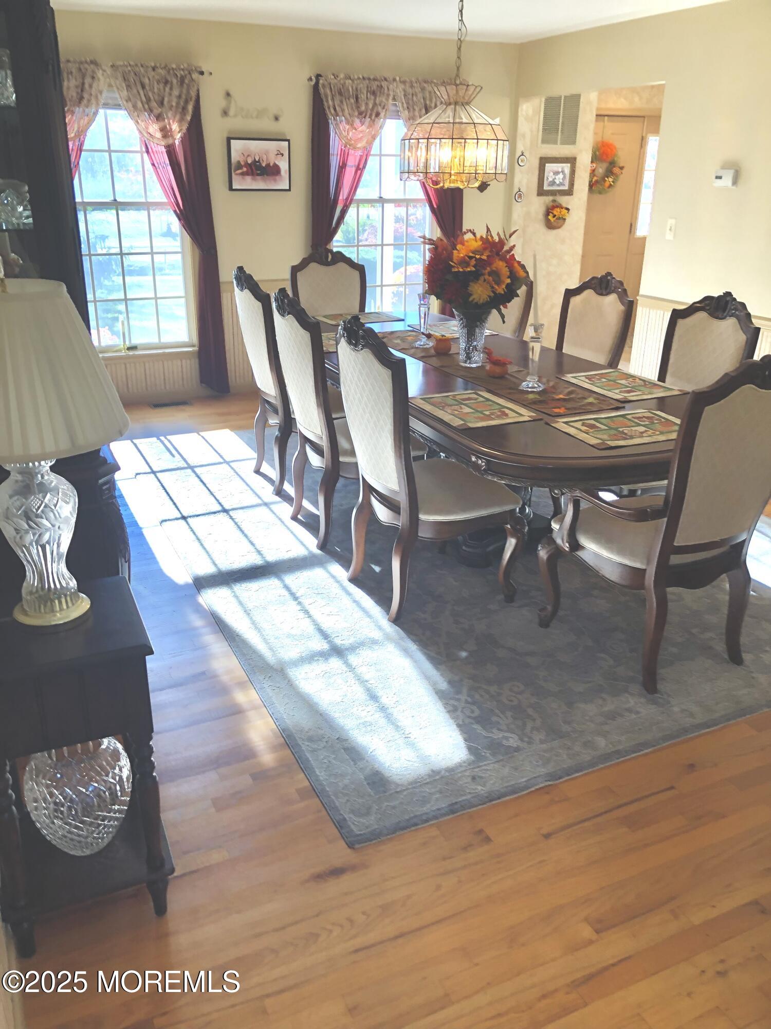 10 Saddlebrook Road Millstone Township, NJ 08535 - Photo 30 of 86 a view of a dining room with furniture and wooden floor