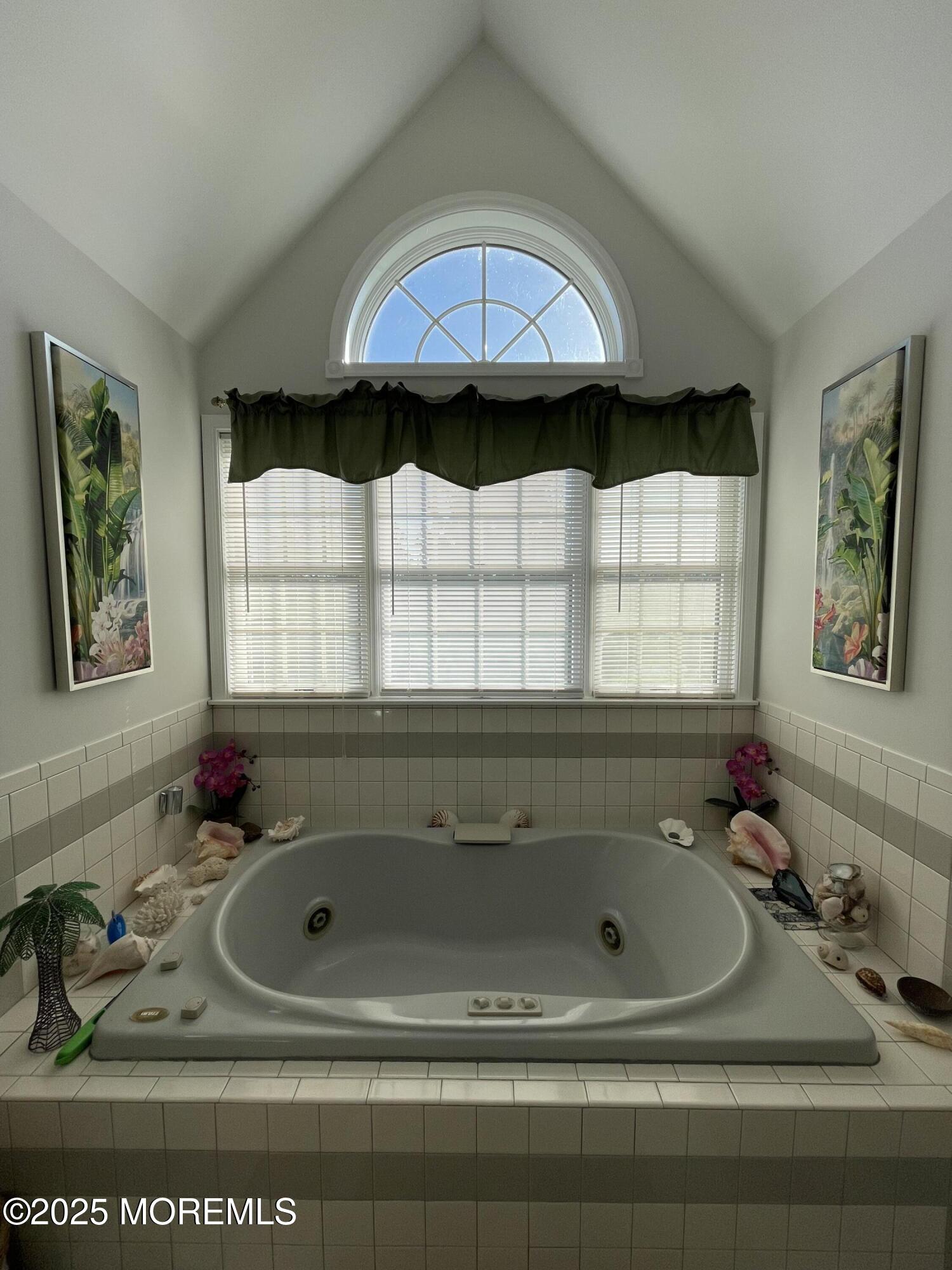 10 Saddlebrook Road Millstone Township, NJ 08535 - Photo 70 of 86 a bathroom with a sink and a bathtub