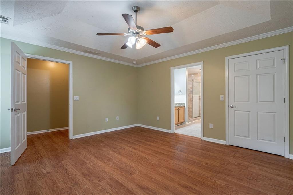 245 Memory Lane Winder, GA 30680 - Photo 25 of 62 a view of an empty room with wooden floor