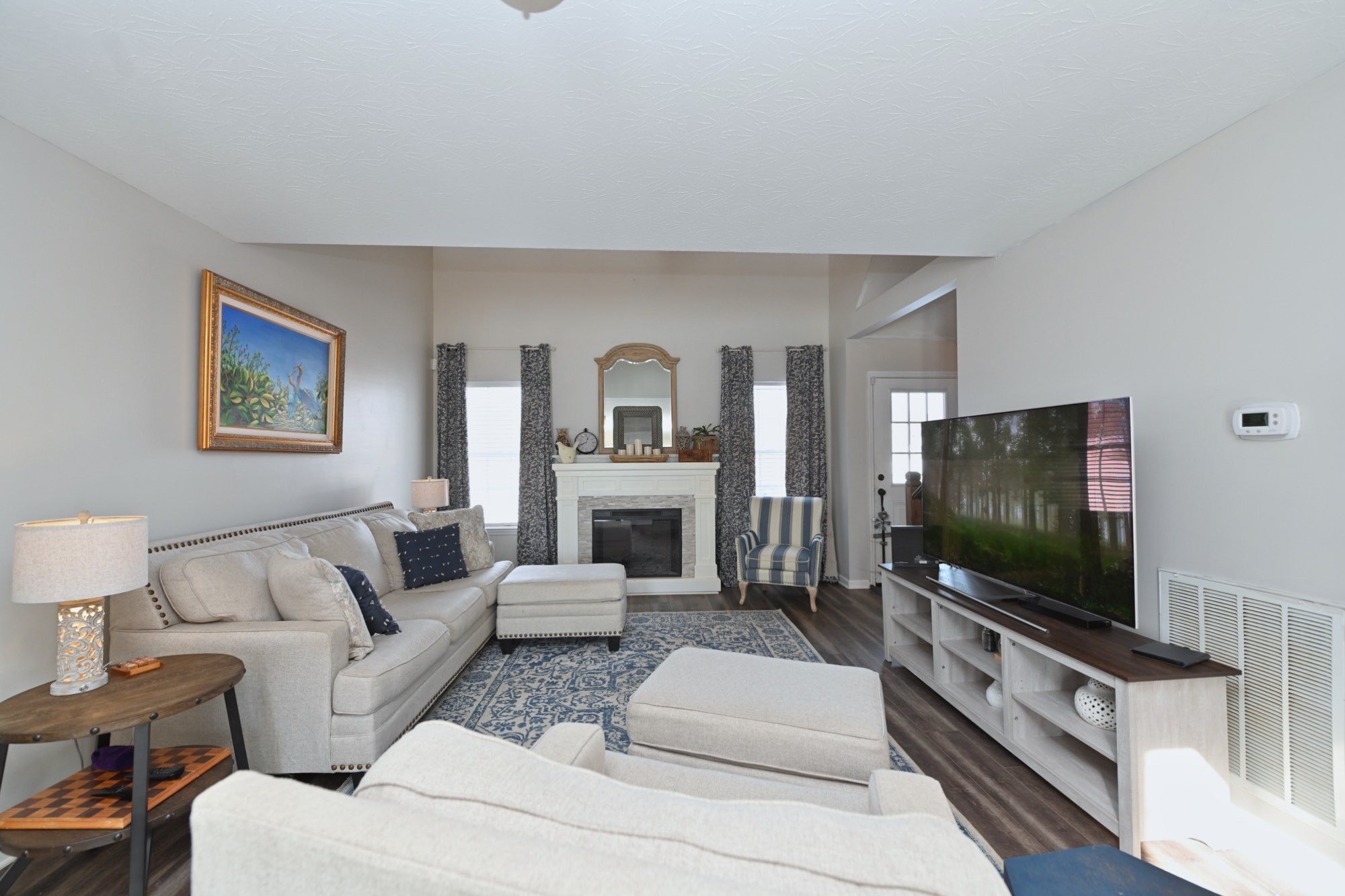 3376 Maxie Jones Road Springfield, TN 37172 - Photo 11 of 48 a living room with furniture and a flat screen tv