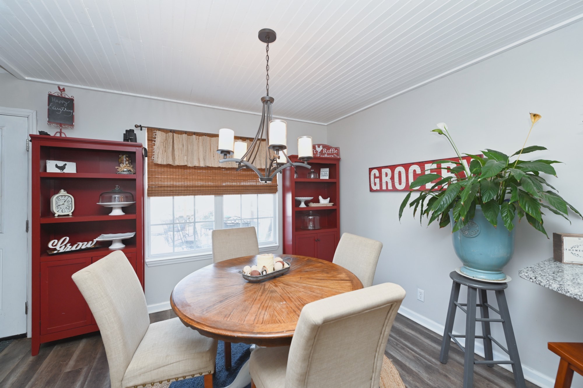 3376 Maxie Jones Road Springfield, TN 37172 - Photo 14 of 48 a view of a dining room with furniture and wooden floor