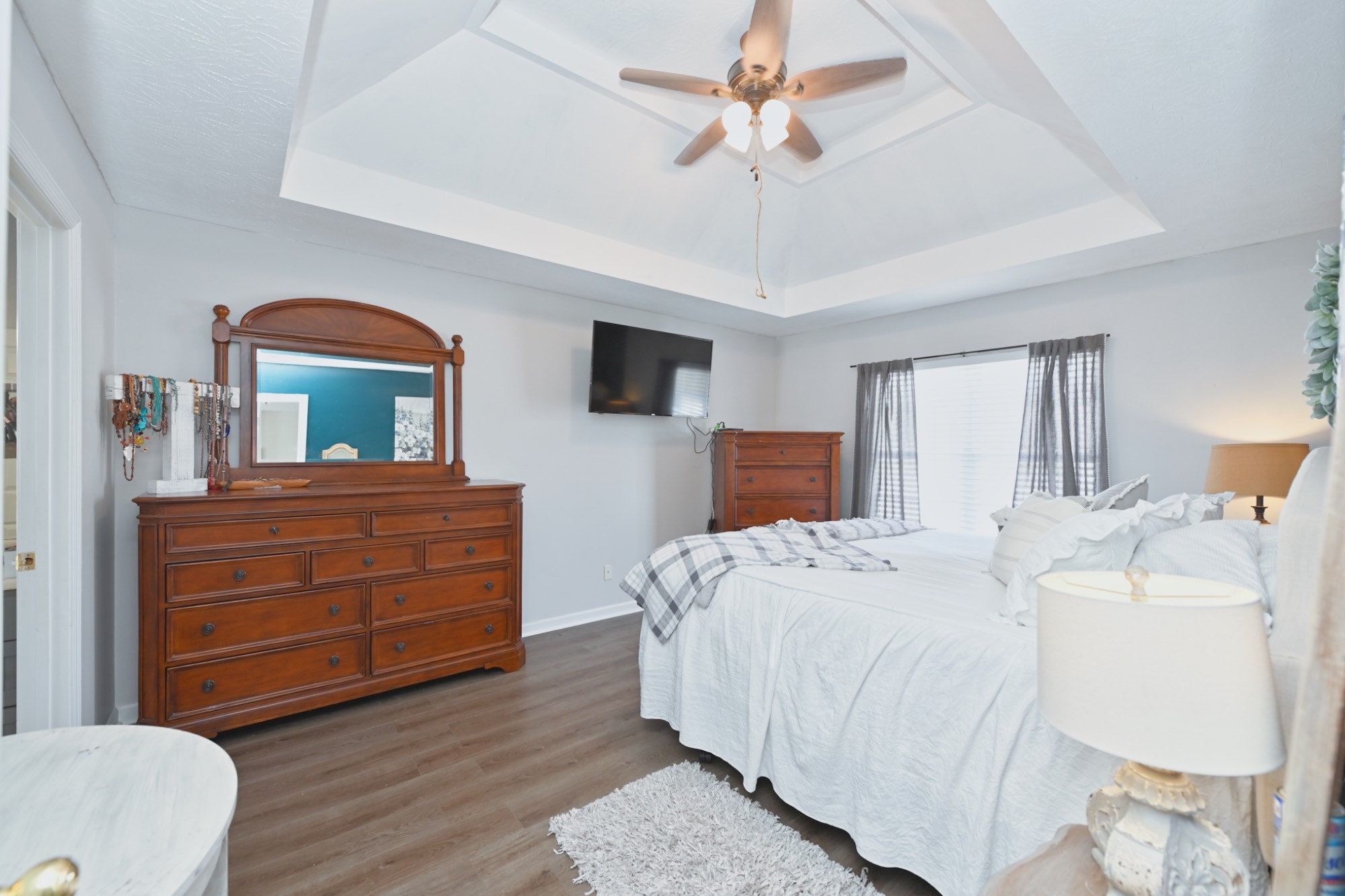 3376 Maxie Jones Road Springfield, TN 37172 - Photo 21 of 48 a bedroom with a bed and a chandelier