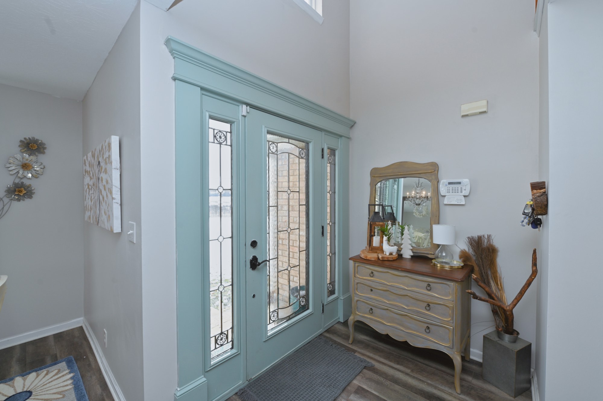 3376 Maxie Jones Road Springfield, TN 37172 - Photo 4 of 48 a room with painting on the wall and a dresser