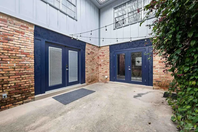 a view of a entryway with wooden walls
