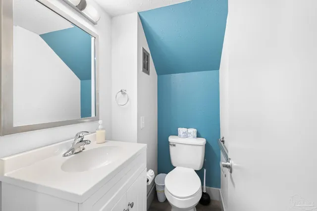 an entryway with a rug