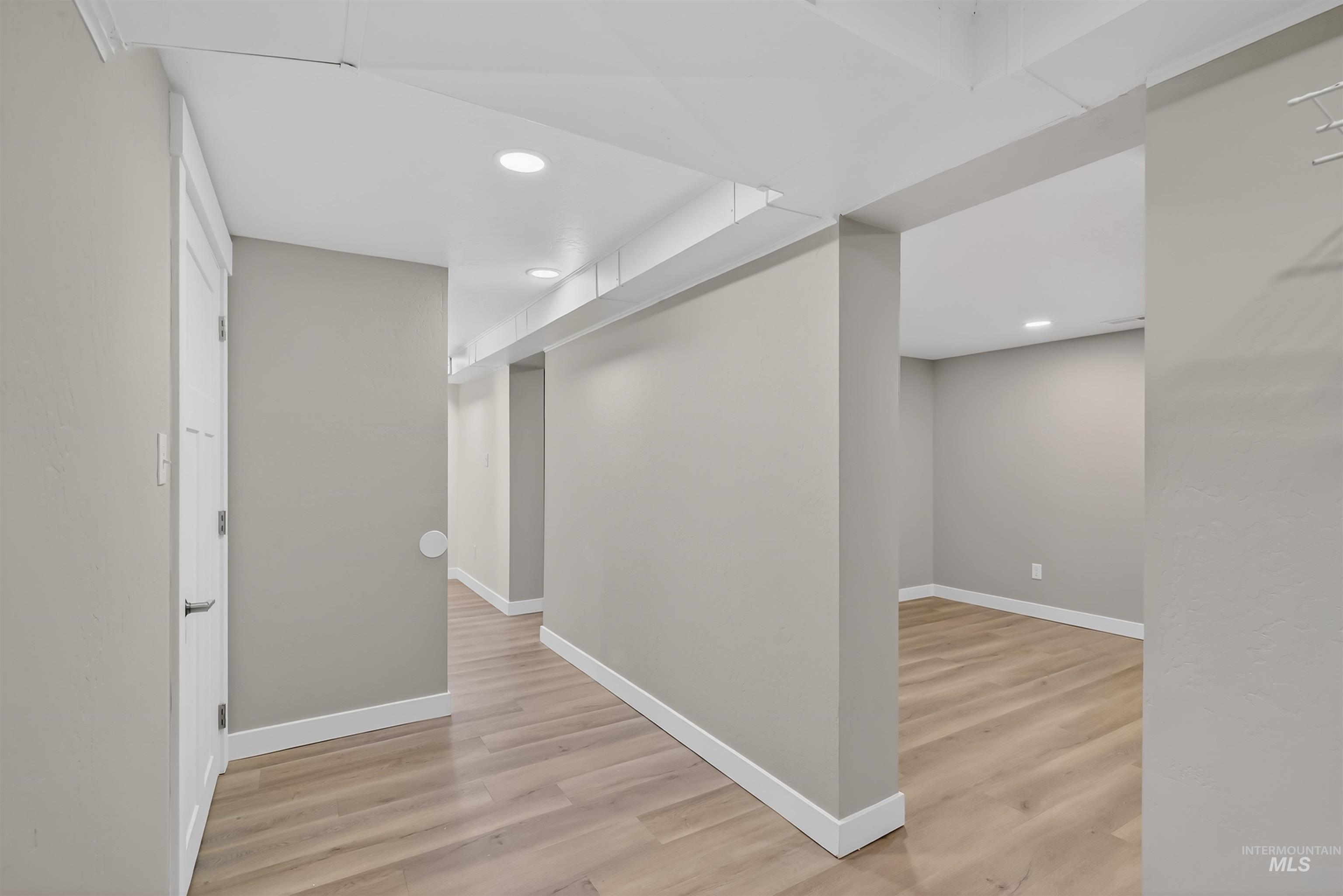 929 10th Street Clarkston, WA 99403 - Photo 26 of 43 Hall with recessed lighting and light wood-style floors