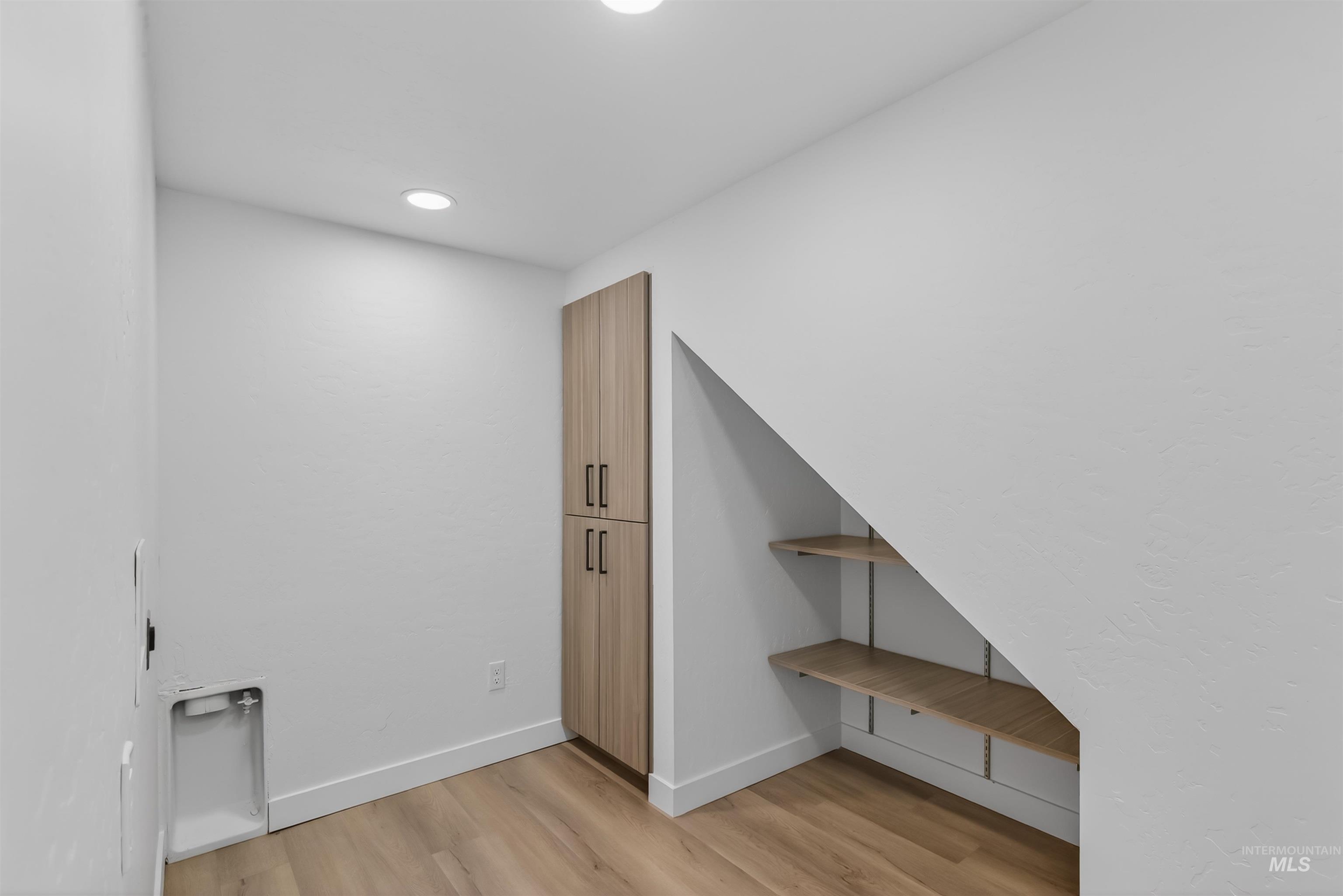 929 10th Street Clarkston, WA 99403 - Photo 30 of 43 Detailed view of wood finished floors and recessed lighting