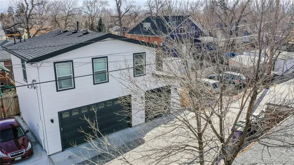 a house with trees in front of it