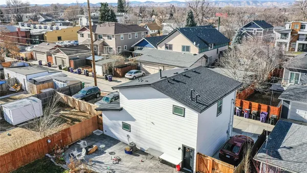 an aerial view of a house with a mountain view