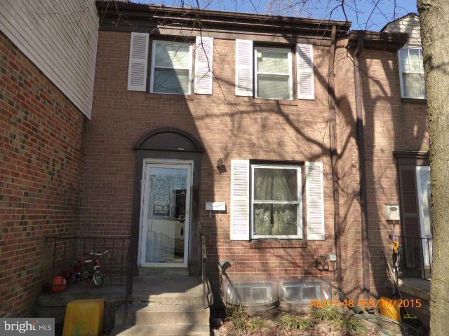 8270 Imperial Drive, Unit 5D Laurel, MD 20708 - Photo 1 of 5 a view of a house with a large windows and a yard