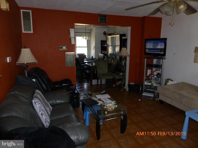 8270 Imperial Drive, Unit 5D Laurel, MD 20708 - Photo 3 of 5 a room with furniture