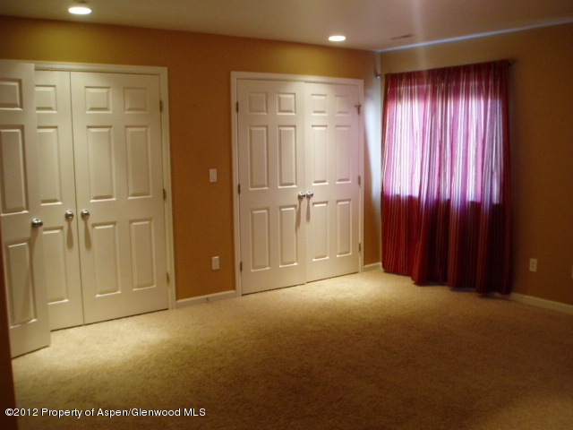 668 Alder Ridge Lane New Castle, CO 81647 - Photo 16 of 30 a view of empty room with windows