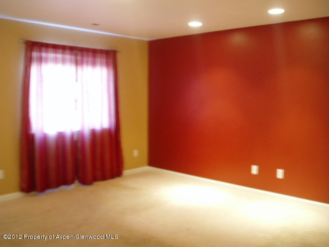 668 Alder Ridge Lane New Castle, CO 81647 - Photo 17 of 30 an empty room with windows