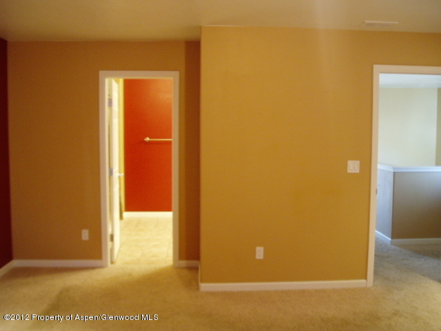 668 Alder Ridge Lane New Castle, CO 81647 - Photo 18 of 30 a view of a bathroom with a door