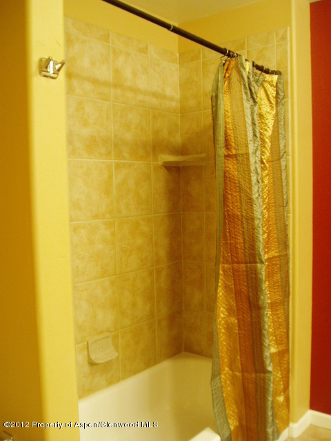 668 Alder Ridge Lane New Castle, CO 81647 - Photo 19 of 30 a bathroom with a shower
