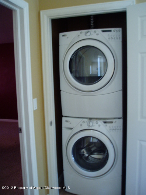 668 Alder Ridge Lane New Castle, CO 81647 - Photo 27 of 30 a utility room with dryer and washer