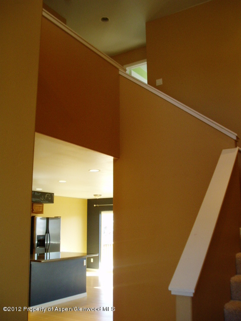 668 Alder Ridge Lane New Castle, CO 81647 - Photo 3 of 30 a view of hallway with a large window