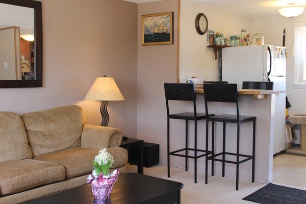 67 Rhodes Circle Hingham, MA 02043 - Photo 4 of 12 a living room with furniture