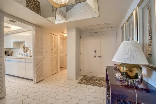 a view of room with furniture and wooden floor