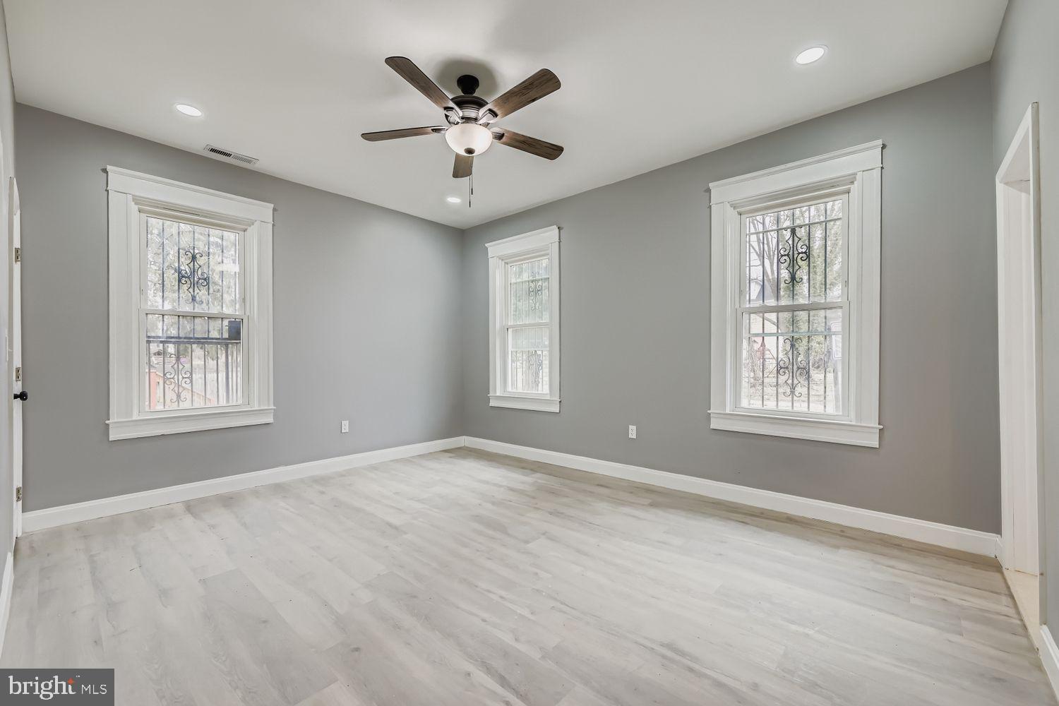 4111 Penhurst Avenue Baltimore, MD 21215 - Photo 16 of 39 a view of an empty room with a window