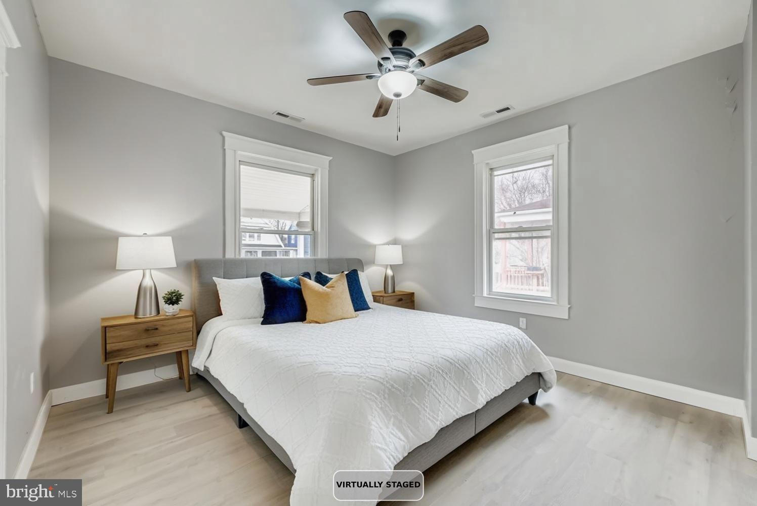 4111 Penhurst Avenue Baltimore, MD 21215 - Photo 19 of 39 a bedroom with bed and window