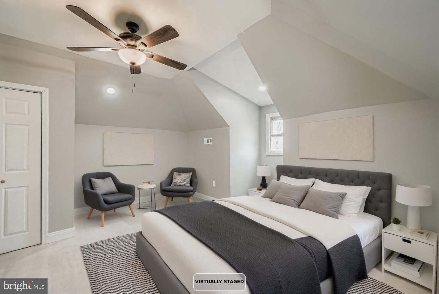 4111 Penhurst Avenue Baltimore, MD 21215 - Photo 23 of 39 a bedroom with a bed and ceiling fan