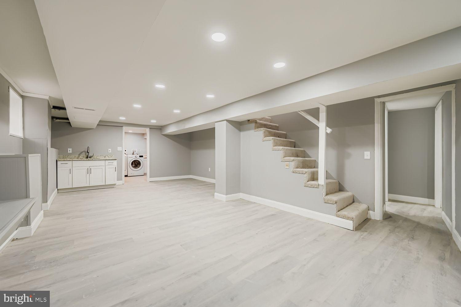 4111 Penhurst Avenue Baltimore, MD 21215 - Photo 26 of 39 a view of a big room with closet and windows