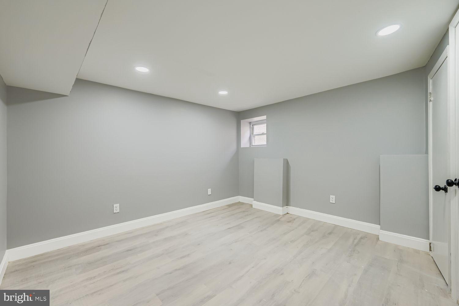 4111 Penhurst Avenue Baltimore, MD 21215 - Photo 30 of 39 an empty room with windows