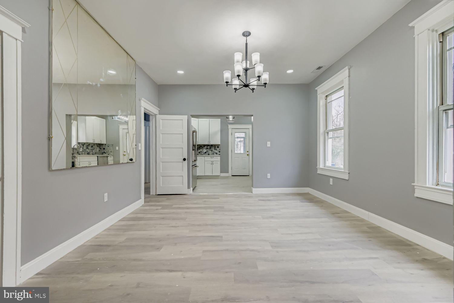 4111 Penhurst Avenue Baltimore, MD 21215 - Photo 7 of 39 a view of an empty room and window