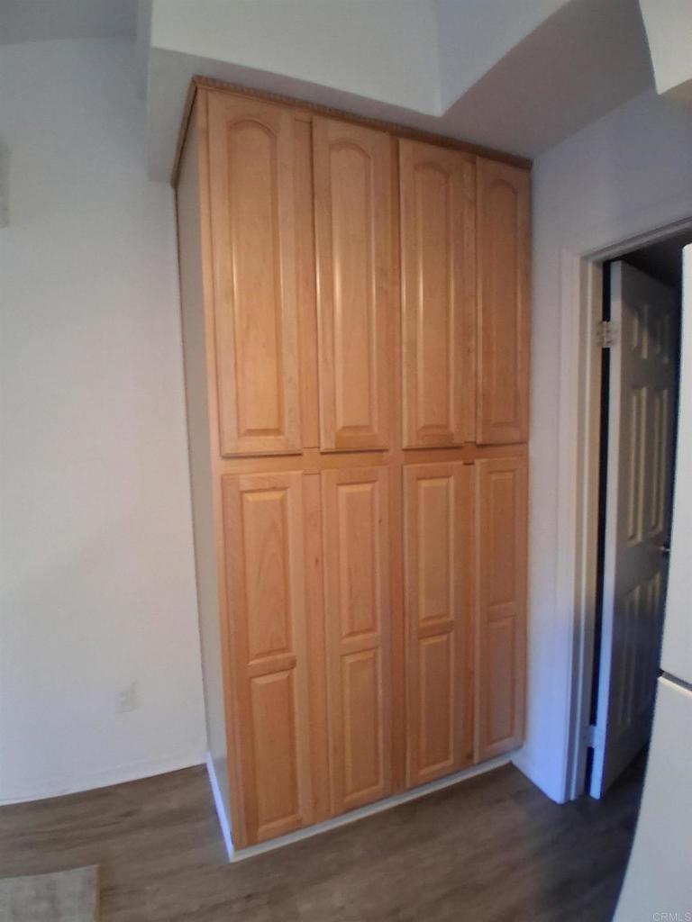 28857 Old Highway 80, Unit 14 Pine Valley, CA 91962 - Photo 11 of 12 an empty room with wooden floor