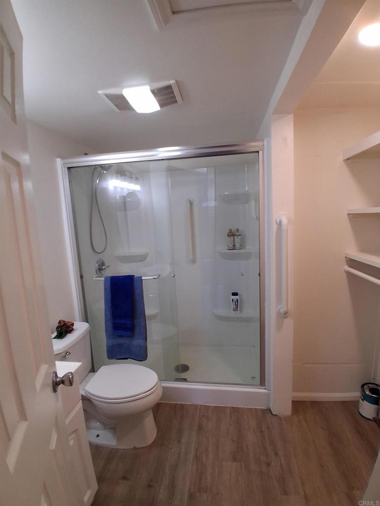 28857 Old Highway 80, Unit 14 Pine Valley, CA 91962 - Photo 7 of 12 a bathroom with a toilet and a shower