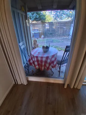 a view of a balcony with furniture