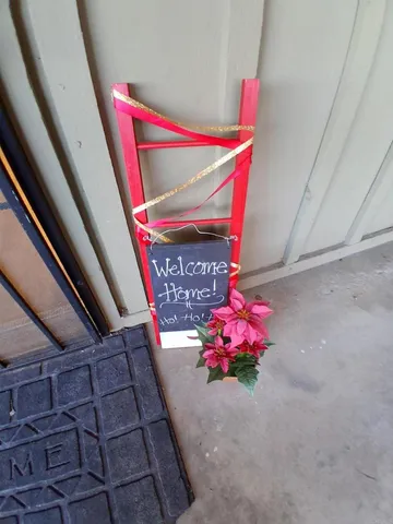 a kitchen with a sink cabinets and window