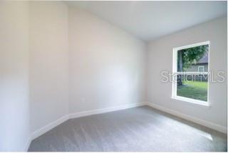 1791 Roberts Trail Bell, FL 32619 - Photo 4 of 28 a view of an empty room with a window