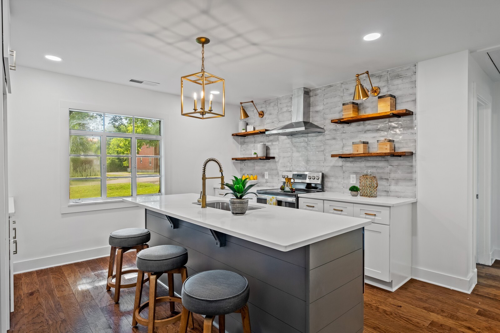 4911 Log Cabin Road Nashville, TN 37216 - Photo 5 of 10 a kitchen with a sink cabinets and wooden floor