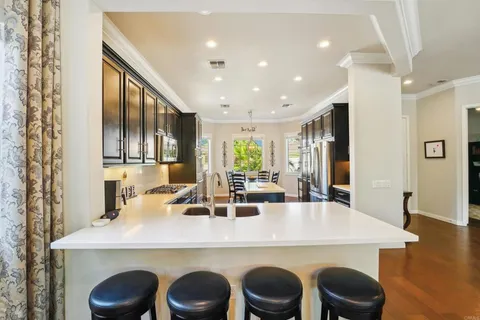 a view of a workspace with furniture